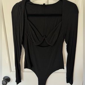 SOLD.  NBD never worn black cutout bodysuit